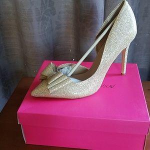 Betsy Johnson gold stilettos